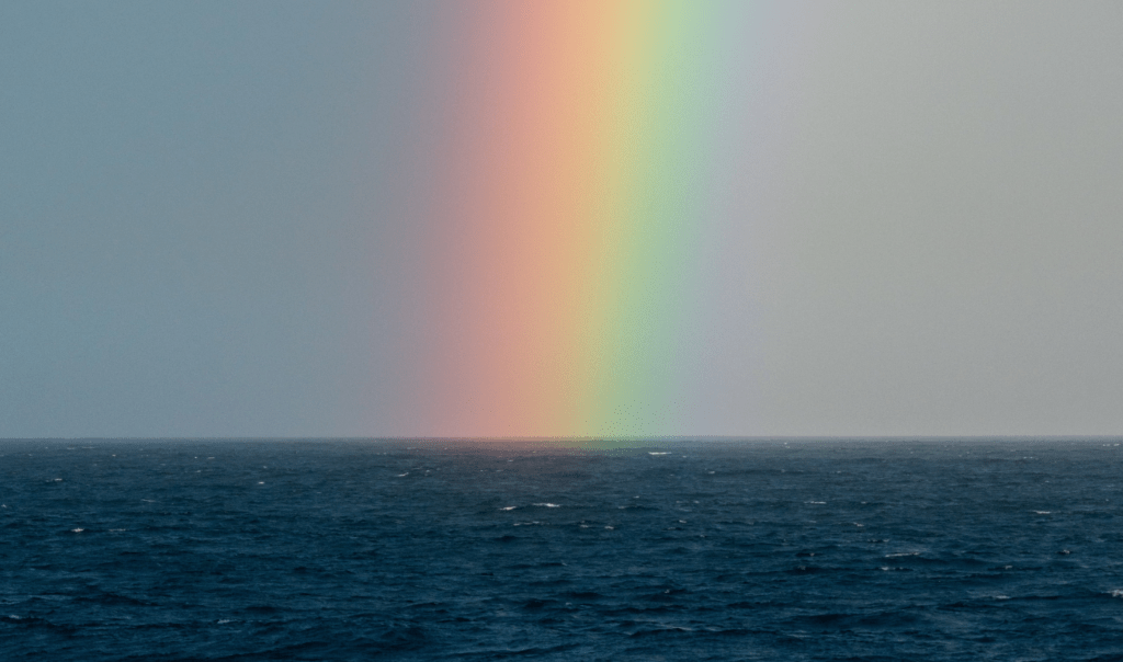 Rainbow over the Ocean. It's like the Ocean is a pot of gold and really: it is. Our Ocean provides us with many resources and produces half the oxygen on Earth. Learn about the Oceans with Ocean Generation.